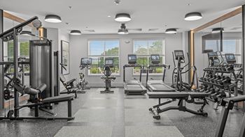 Fitness Center with Cardio Equipment, Fixed Weight Machines, Free Weights and Stretching Mats